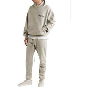 
                  
                    Fear Of God Essentials Heather Oatmeal Hoodie (SS22)
                  
                
